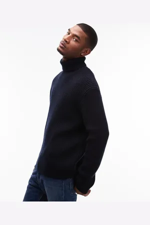 ARKET Wool blend knitted rib oversized roll neck sweater in