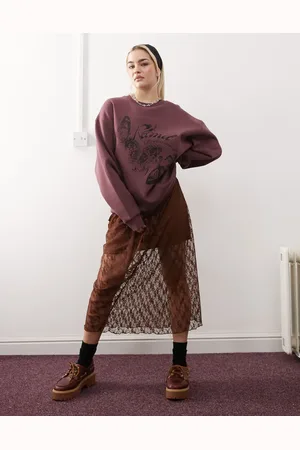 Reclaimed Oversized crew neck sweatshirt with butterfly print in -Red