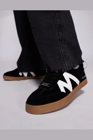 Steve Madden Degree lace up sneakers in black and white