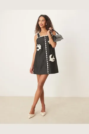 Sister Jane Swallow heart embroidered mini dress in black