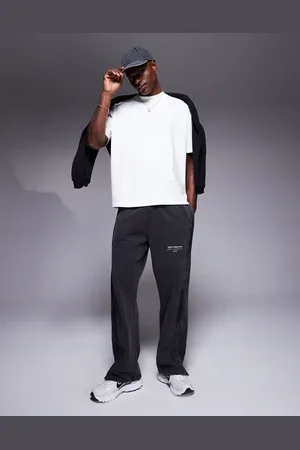 Good For Nothing Raw edge seam trackies in washed black