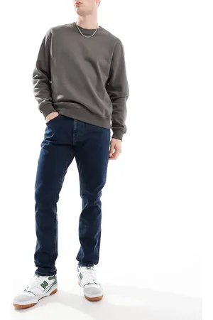 Tommy Hilfiger Austin slim tapered jeans in dark wash-Blue
