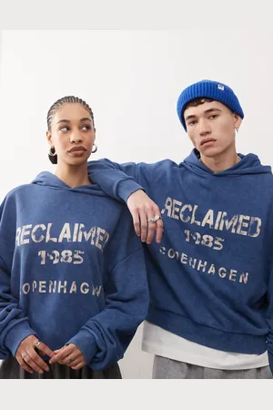 Reclaimed Unisex graphic print hoodie in washed