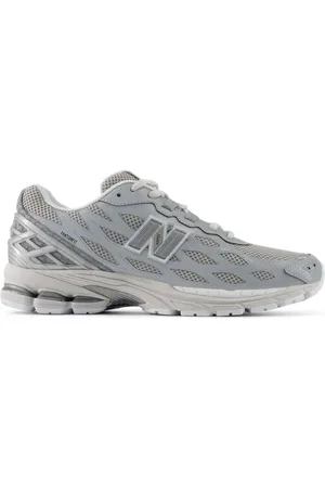 New Balance 1906W trainers in white and