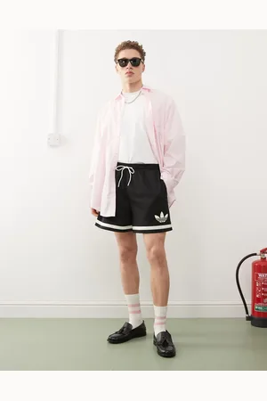 adidas Basketball Warp knit shorts in black
