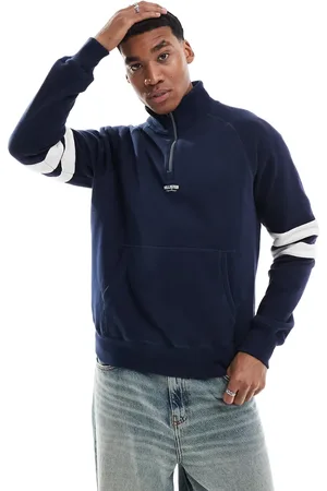 Hollister Boxy contrast varsity logo detail quarter zip sweat top in