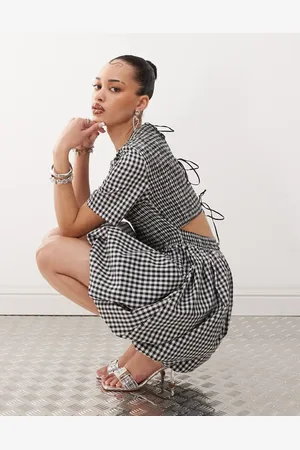 Amy Lynn Shirred peplum mini dress with tie back in -Multi
