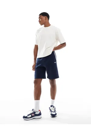 Hollister Loose varsity logo shorts with side stripe in