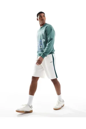 Hollister Loose varsity logo shorts with side stripe in -Neutral