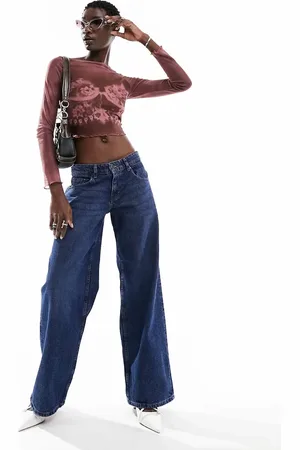 Motel Extra wide low rise jeans in wash
