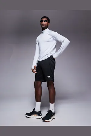 The North Face Reaxion logo fleece shorts in