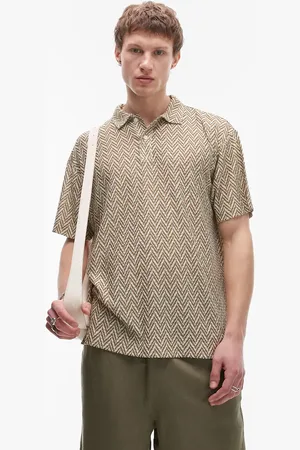 Topman Oversized fit polo with design jacquard in