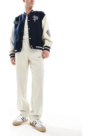 ASOS Baggy cord pants with embroidered patch in stone-White
