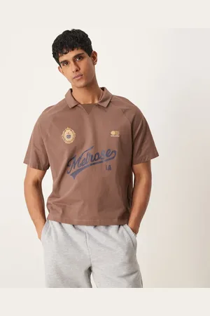 ASOS Boxy oversized polo with sports graphic in brown