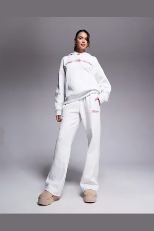 Kaiia Bow waistband detail wide leg embroidered logo trackies in (part of a set)