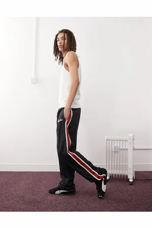New Era Side stripe wide leg track pants in