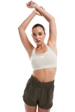 adidas Adidas Training Essentials sports bra in stone-Neutral