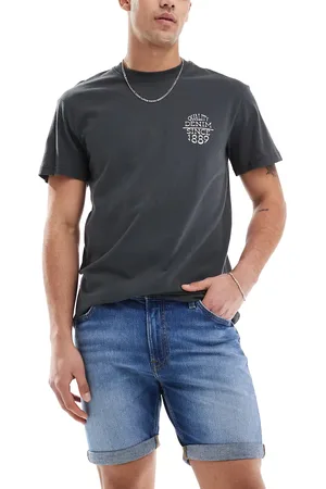 Lee Rider slim fit shorts in mid blue wash