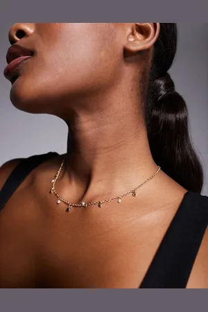 True Decadence Long crystal charm necklace in
