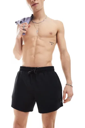 COLLUSION Shorter length swim shorts in
