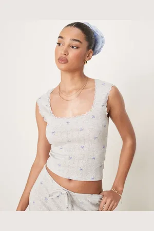 Gina Tricot Mix and Match pointelle embroidered edge cotton singlet with blue bows in