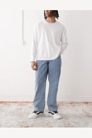 Vans Check-5 Blaze all over print loose fit denim jeans in washed blue