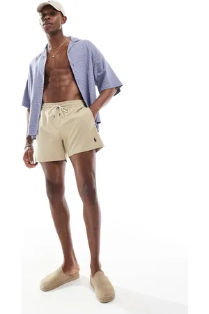 Ralph Lauren Traveler icon logo slim fit mid swim shorts in -Neutral