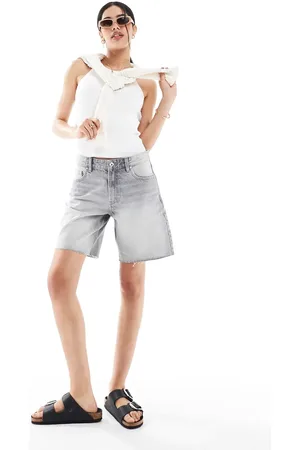 Bershka High waisted raw hem longline denim shorts in washed