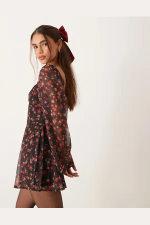 Miss Selfridge Long sleeve playsuit in black ditsy -Multi