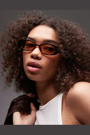 Le Specs Outta Love oval sunglasses in tortoiseshell with amber lens