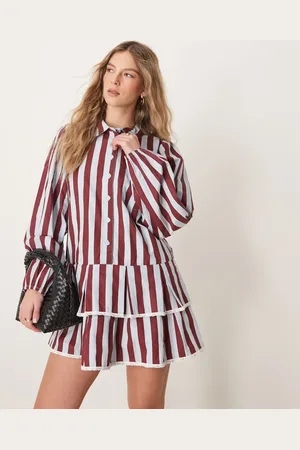 Neon Rose Drop hem striped pleated hem mini dress in multi-Red