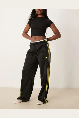 adidas Firebird loose track pants in and yellow