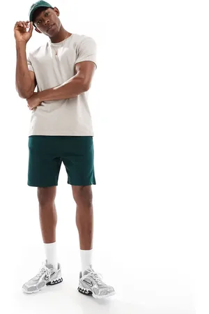 Bershka Jersey shorts in dark