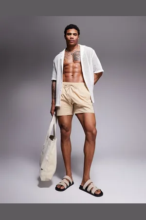 HUGO BOSS BOSS Iconic side stripe logo swim shorts in -Neutral