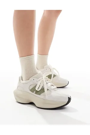 New Balance WRPD sneakers in off white and olive green