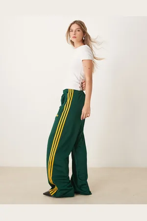 adidas Firebird loose track pants in green