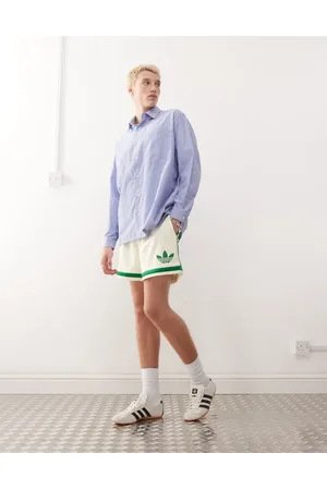 adidas Basketball Warp knit shorts in white