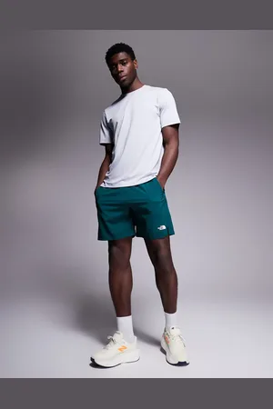 The North Face 24/7 7" logo shorts in green