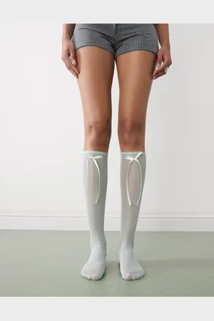Reclaimed Knee high socks with bows in blue mesh