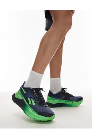 Reebok Zignition running trainers in and green