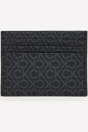 Calvin Klein All over logo print card holder in black