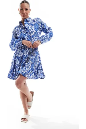 ONLY Dropped hem tie waist mini dress in blue tile print