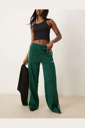 adidas Firebird loose track pants in green