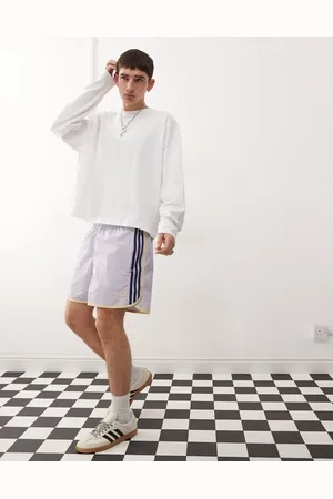 adidas Adicolor sprinter shorts in lilac