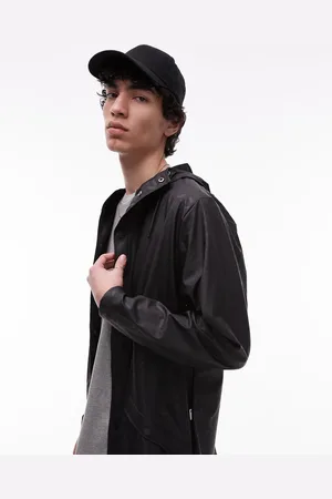 Rains 12010 waterproof short jacket with tonal logo in black