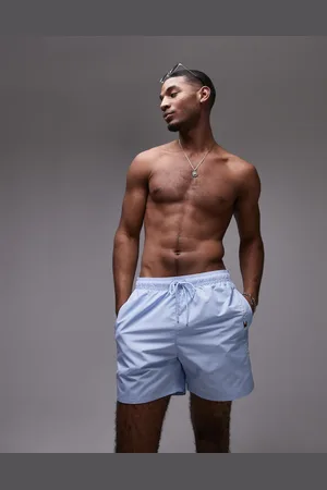 Tommy Hilfiger Side logo drawstring swim shorts in pale blue