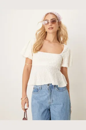 Gina Tricot Wavy textured jersey top with puff sleeves and peplum hem in