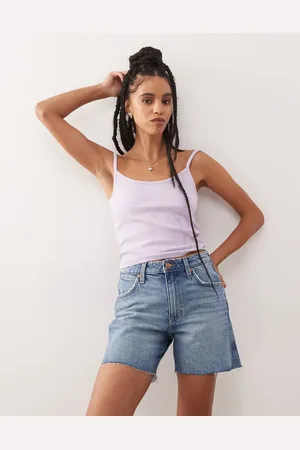 Wrangler 5inch cowboy shorts with distressed hem in mid wash blue