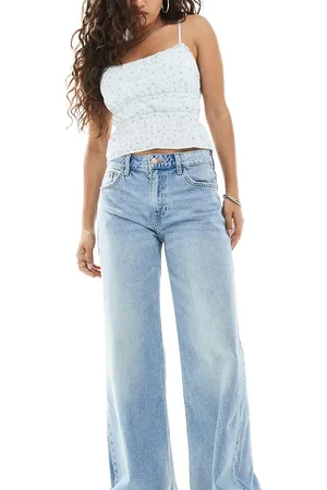 Bershka Petite high waisted wide leg jeans in light wash blue
