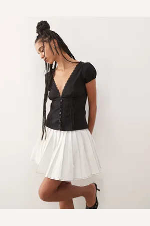 Amy Lynn Ziggy contrast pleated mini skirt in
